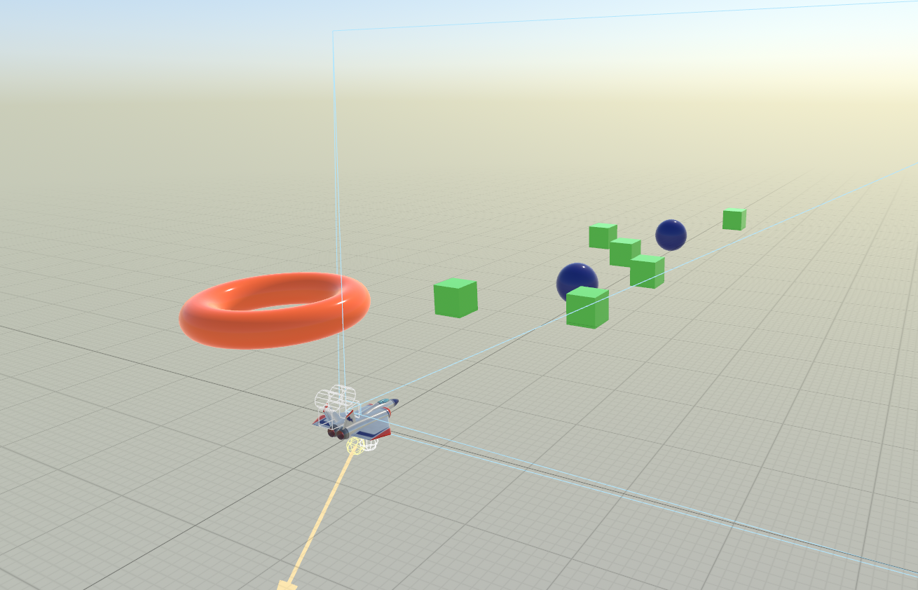 The SceneKit editor showing a scene with multiple simple objects, red torus, green cubes, and blue spheres